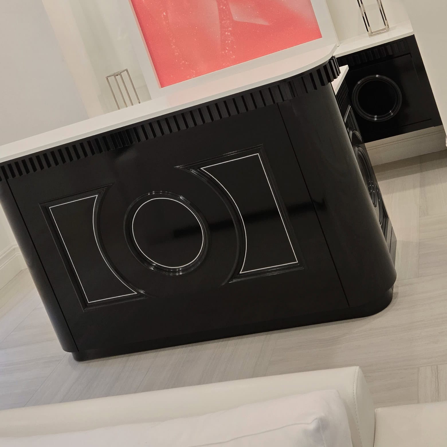 Custom wood bar unit that was designed to look like a camera