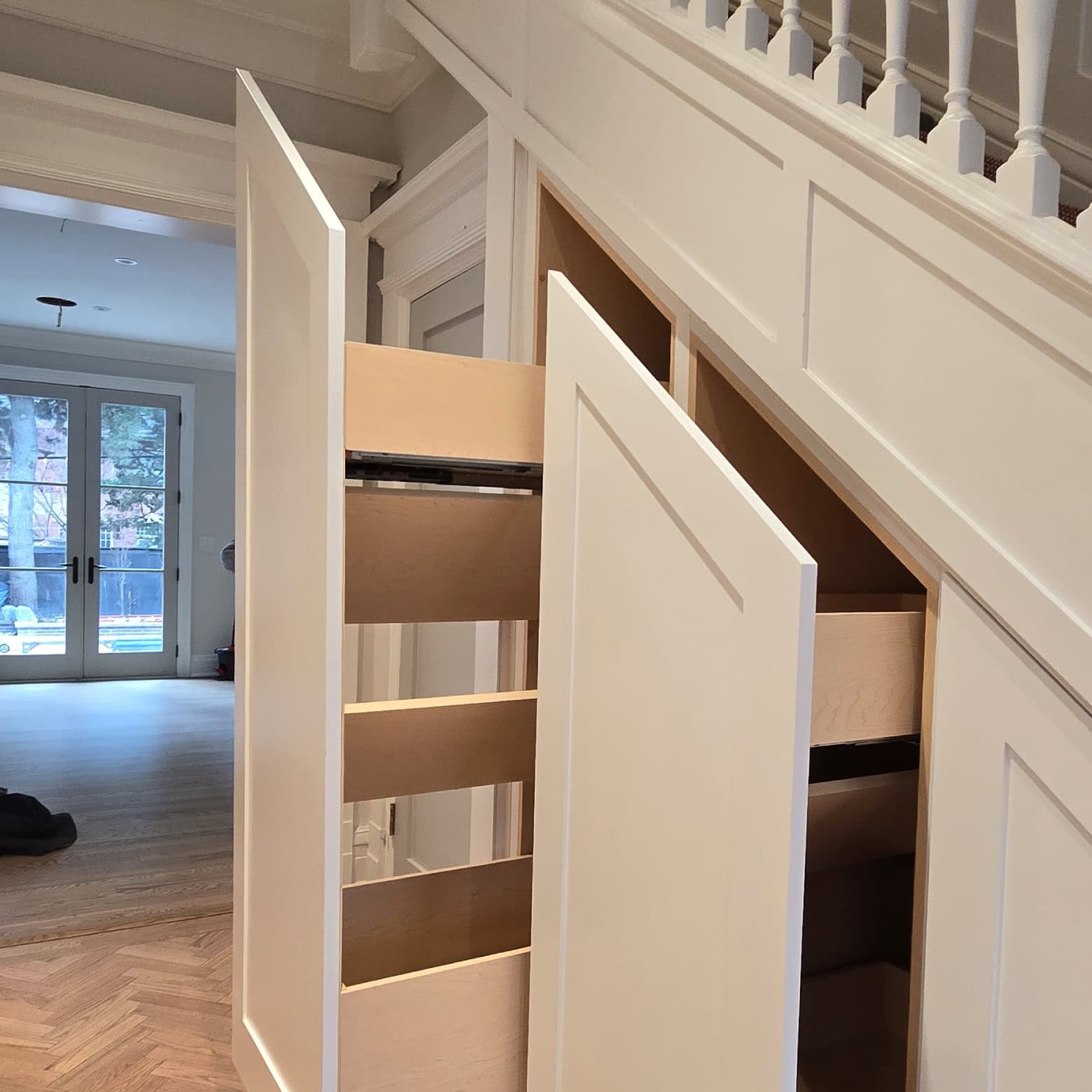 Custom under the stair shelving system in Toronto