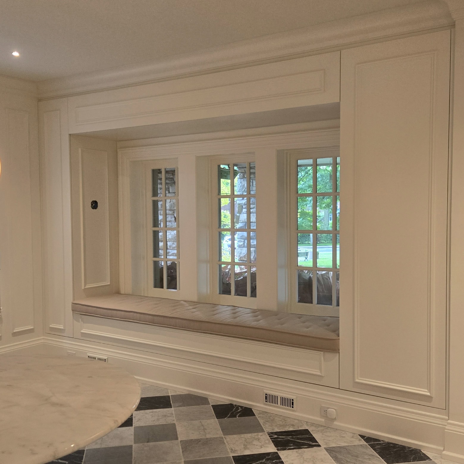 wood window nook with seating